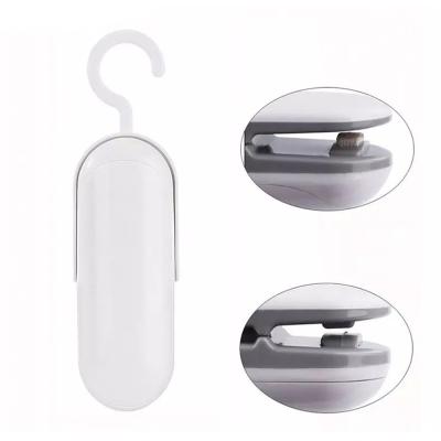 China Mini Hand Held Portable Household Mini Heat Bag Sealers Handheld 2 in 1 Portable Heat Bag Sealer and Cutter for Sealing Plastic Bags for sale