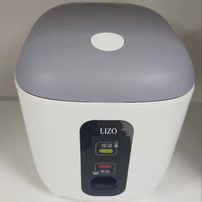 China 0.6 Liter Mini Rice Cooker Small Easy Clean Rice Cooker Hot Dish for sale