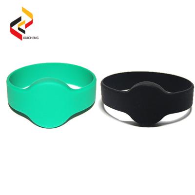 China NTAG213 NTAG203 disposable smart logo printing RFID NFC silicone wristband for sale