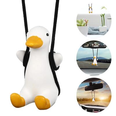 China Cute Sitting Duck Car Hanging Ornaments Car Rearview Mirror Swing Cartoon Duck Toy Pendant for Car Decorations for sale