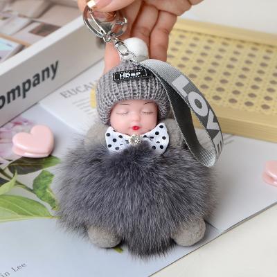 China Promotional Gift New Arrival Faux Fur Sleeping Dolls Small Key Chain Dolls Bag Decoration Penda for sale