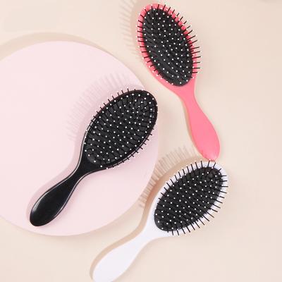 China Wholesale Logo Customized Oval Cushion Paddle Hair Brush Manufacturers for sale