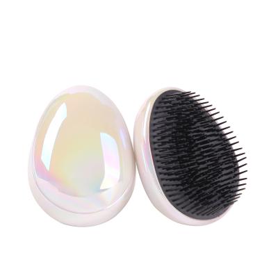 China Plastic Portable Home Egg Shape Hair Brush Small Size For Travel for sale