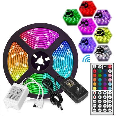 China Hotel factory price IP65 waterproof SMD2835 RGB led strip light with 44keys remote and 2A power adapter for sale