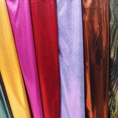 China 2020 New Good Memory Knitting 100%Polyester Stretch Shine Soft Colorful Foiled Bronzed Fabric For Dresses Africa for sale