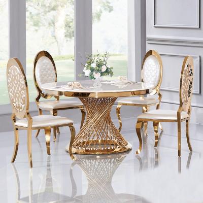 China Marble Top Table Round Stainless Steel Marble Top Base Mirror Dining Table Gold Luxury Dining Table for sale