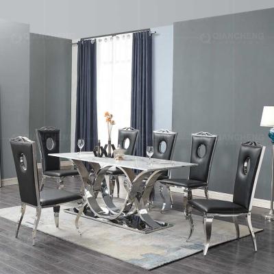 China Modern marble dining table set regular luxury dining table 6 seater furniture stainless steel for sale