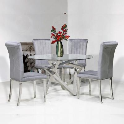 China Foshan Adjustable Cheap Glass Top Dining Table Stainless Steel Silver Base(Height) Round Glass Dining Table And Chairs for sale