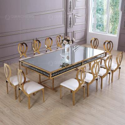 China Modern Banquet Event Party Supplies Stainless Steel Mirror Glass Top Crystal Wedding Table for sale