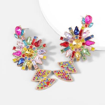 China Sun Flower Rhinestone Alloy Diamond Alloy Eco-Friend Personality Retro Helix Shaped Female Super Snap Earrings for sale