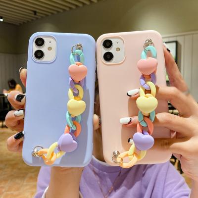 China Girls Shockproof Mobile Back Cover For iPhone Covers Heart Wristband For iPhone 13 Pro Cute Cases With Hearts for sale