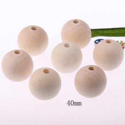 China Multi-Specification Safe Wholesale Round Natural Wooden Beads for sale