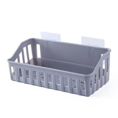 China Modern Punch Free Shelf Storage Basket Plastic Wall Mounted Toilet Storage Rack for sale