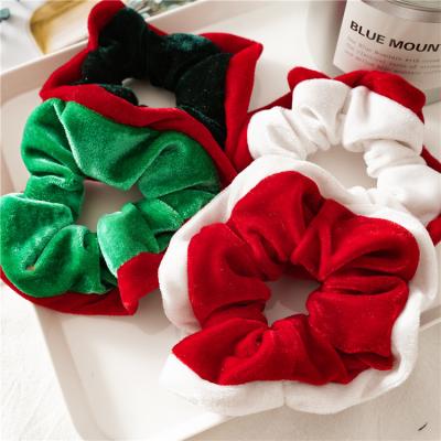 China Holiday Series Hair Accessories Attractive Attractive Christmas Colors Hair Bands Elastic Velvet Scrunchies Ponytail Holder For Women for sale