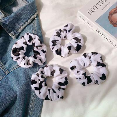 China New Cow Printing Autumn Winter Popular Scrunchies Black And White Elastic Hair Accessories For Women for sale