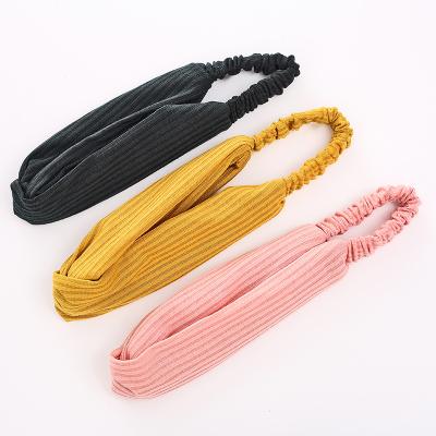 China Fashion fashion knotted stretchy boho solid color hair bands turban cross headwrap for yoga workout headbands hair accessories for sale