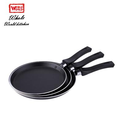 China 2019 hot sale big kitchen tawa pizza pan set multi functional aluminum non stick durable for sale