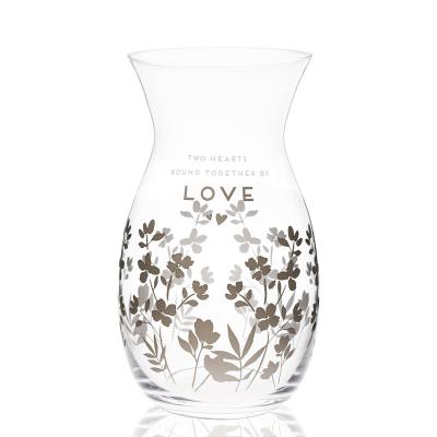 China Modern High Quality Creative Love Glassware Bottles Flower Pattern Vase Oriented Laser Engraving for sale