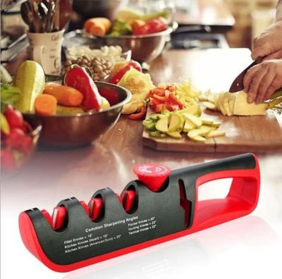 China Disposable Hot Selling Knife Sharpener 4 In 1 Easy Manual Knife Sharpening And Scissors Kitchen Accessories for sale