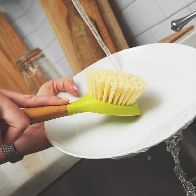 China Long Handle Dish Brush Dish Scrubber with Built-in Food Scraper Pan Pot Dish Sink Brush Bamboo Brush for sale