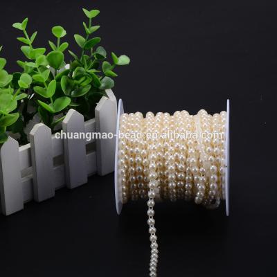 China Garment Accessories ABS Plastic String Bead String Roll Clothing Accessories Plastic Semi-Round Bead Roll for sale