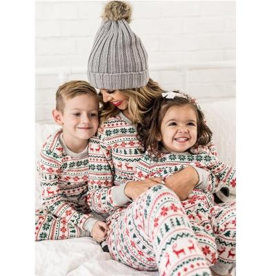 China QUICK DRY mood for Christmas morning family wear jogger style pants matching top and ivory red set of Frosty Night Women pajamas for sale