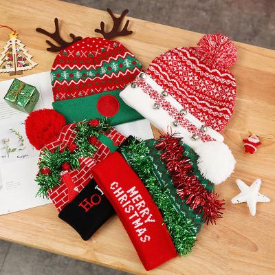 China Keep warm 2021 autumn and winter new knitted adult Christmas hat knitted woolen jacquard Christmas hat with light bell for sale