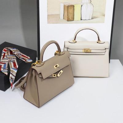 China 2023 High Quality Gray Elephant Handbag High Quality Leather Bag Female Office Worker Hand Whip Limited Edition Joker Top for sale