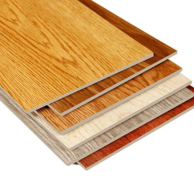 China Gray Vinyl Tile Wood Design Waterproof and Fireproof Embossed Texture Spc Vinyl Panel Flooring Bathroom Plastic Vinyl Tiles for sale