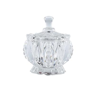 China Wholesale Vintage Stocked Carving Engraved Glass Storage Candy Jar For Household for sale