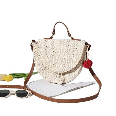 China Wholesale Beach Leisure Decoration Small Shoulder Bag Corn Husk Straw Handbag Cross Travel Storage Bag One - Body Bag Straw Bag for sale