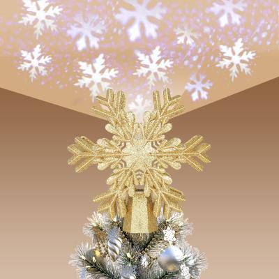 China Christamas Home Decoration New Product Christmas Tree LED Spooky Light Snowflake Projector Rotating Christmas Tree Ornament for sale