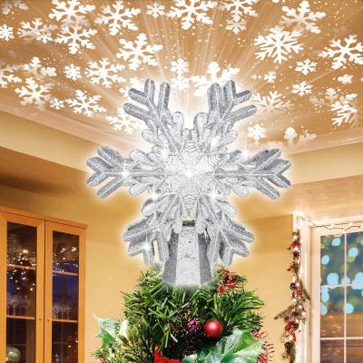 China Christamas Home Decor Xmas Treetop Projector Snowflake Metal Rotating Christmas Ornament for Winter Xmas Decorations for sale