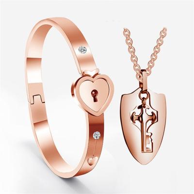 China FASHIONABLE Silver Plated Heart Locks Couples Jewelry Stainless Steel Key Chain Wholesale Bracelet for sale