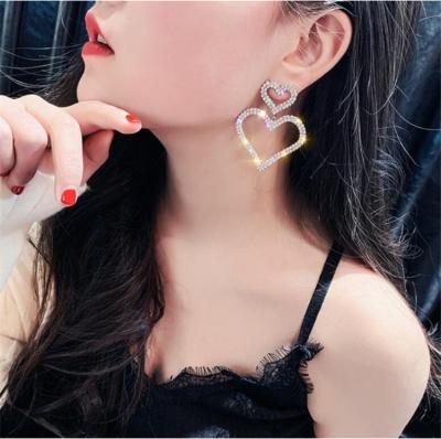 China 2022 925 fashion full double European stiletto earrings long silver TRENDY peach and American love heart wild earrings for sale