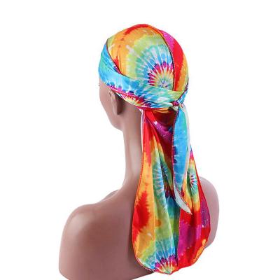 China UNIQ Fashion High Quality Fashion Thickened Pirate Tied Dyed Hat Long Tail Durag Headwear Hip Hop Silky Turban Hat for sale