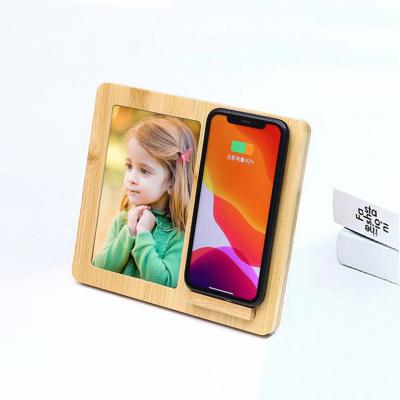 China New Style Fast Charging Desktop Bamboo Wireless Charger With Photo Frame 2 in 1 Wireless Charging Phone Holder for sale