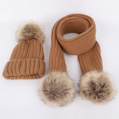 China Korean children COMMON style hat and scarf costume thickening knitted ear protection knit Beanie Hat With Pom Pom for sale