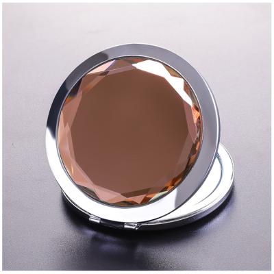 China Double Side HD Glass Crystal Round Metal Foldable Pocket Magnifying Makeup Mirror for sale