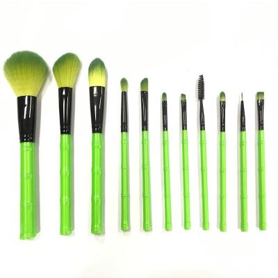 China Angular Blush Professional Makeup Green Color Eyeshadow Brush OEM Bamboo Brush Mascara Brush for sale