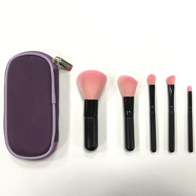 China Angular Blush 5 Pieces Cosmetics Make Up Brushes Pink Hair Makeup Brush With Pouch for sale