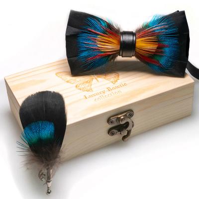 China Newest Design Luxury Handmade Feather Bowtie Red Black Blue Leather Feather Bowtie Pin Set For Men Suit Wedding Suit Accessories for sale