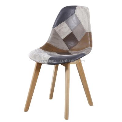 China Norsic style hot factory sale fashion design patchwork fabric dining chair with wooden leg for sale