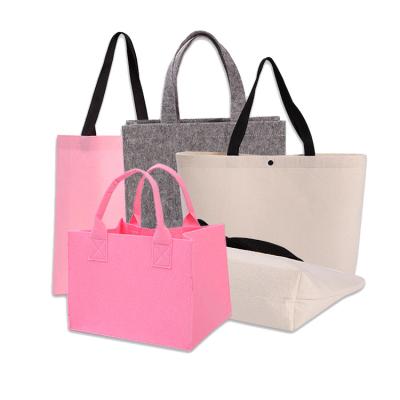 China High quality custom style felt handbags simple design fashional tote bag organizer shopping bags for sale