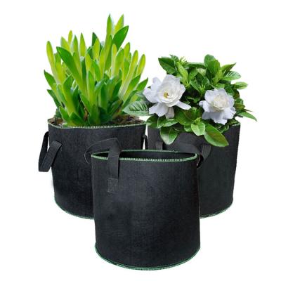 China Plant Growth 3 5 7 10 15 20 25 30 Gallon Nursery Garden Pot Felt Cloth Plant Grow Bags For Vegetable for sale