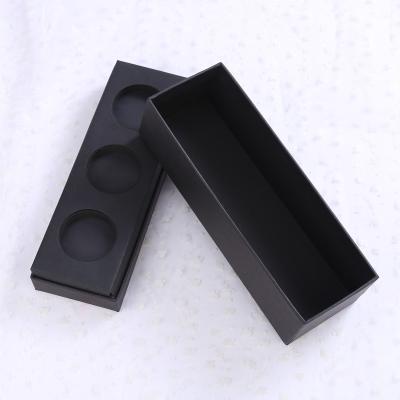 China Recycled Materials Wholesale Custom Hard Ribbon Handle Paper Gift Box Packaging Box for sale