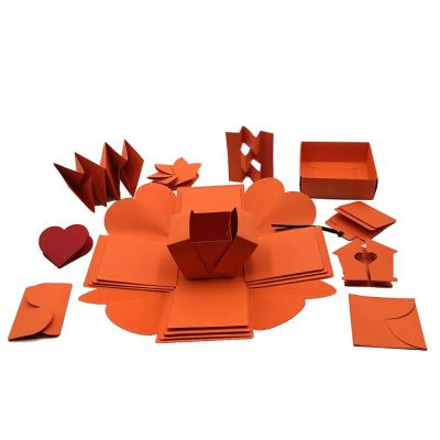 China Explosion handmade orange paper box DIY album birthday party surprise organ creative gift box for sale