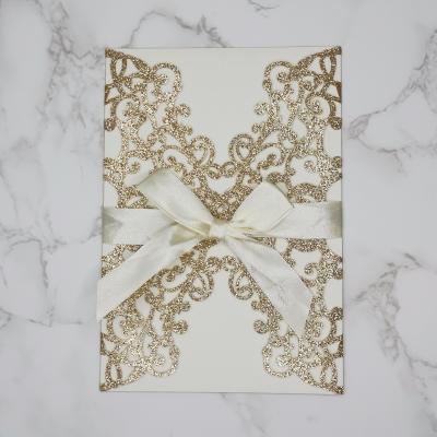 China Europe Glitter Laser Cut Wedding Invitations With Ribbon And Envelopes Personalized Wedding Invitations Cards Factory Sale Directly for sale