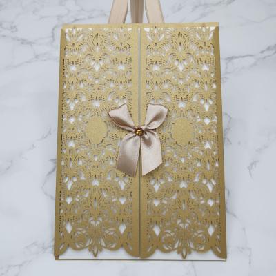 China Europe Elegant Wedding Invitations Luxury Gold Laser Cut Wedding Invitations With Butterfly Ribbon for sale