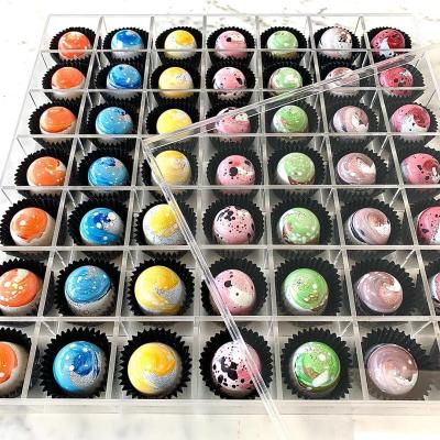 China Custom Storage Style Transparent Acrylic Luxury Candy Chocolate Box Display 49 Hole Box for sale